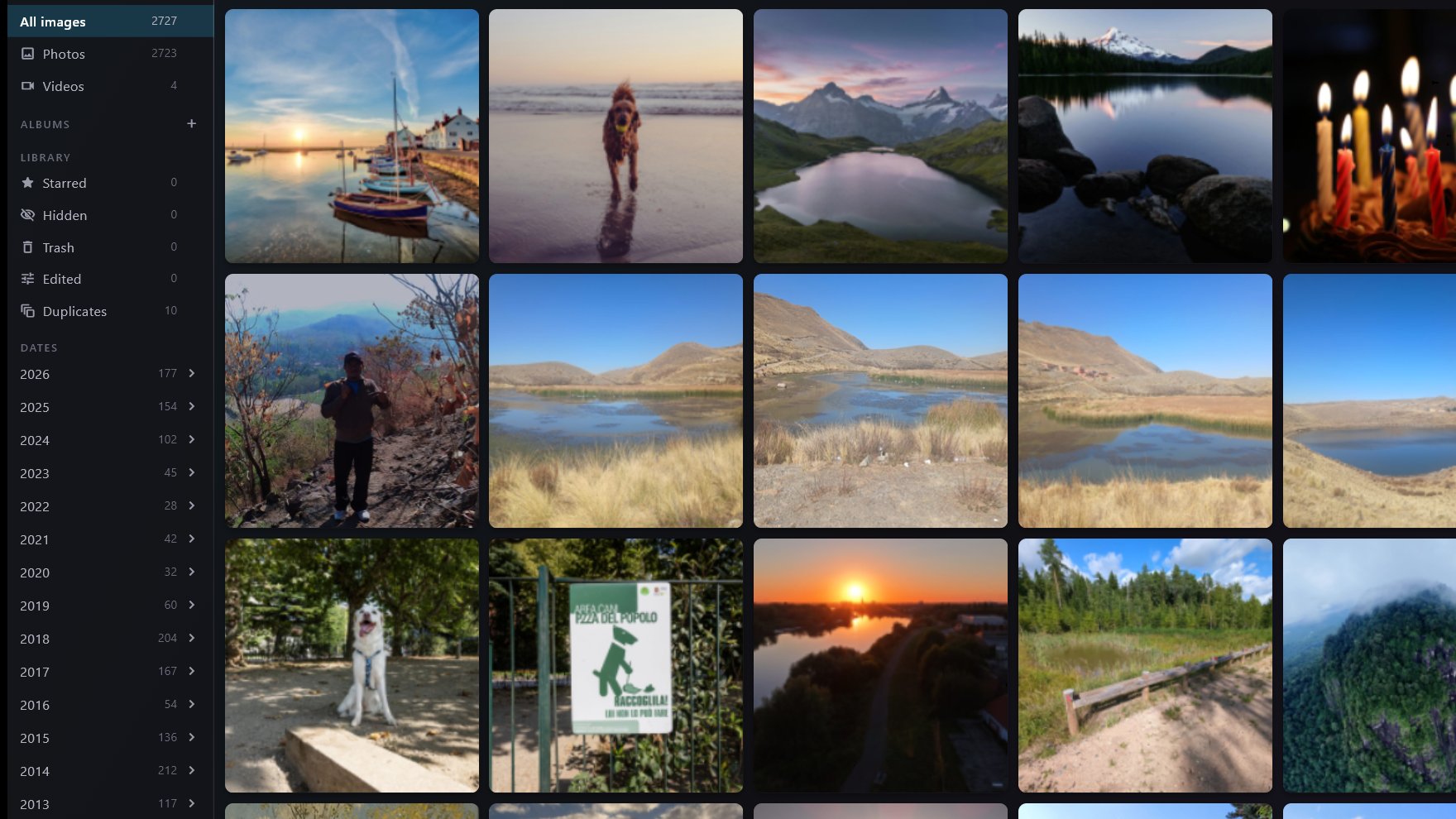 The Portman2 library view: a grid of photographs beside a sidebar counting 2,727 items, 2,723 photographs, 4 videos, and a list of years from 2026 down to 2013 with a count against each.